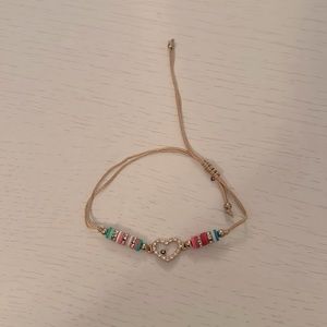 Bracelet color is cream,